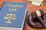 Law book with a gavel - Criminal law