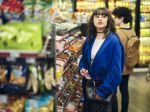 Young Woman Shoplifting in a Convenience Store