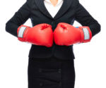 Woman defense lawyer in boxing gloves