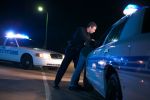 Police Arresting Drunk Driving Suspect